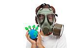 Forests importance - ecology concept with child wearing gas mask holding earth globe