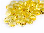 Omega Fish Oil pills, close-up macro on white background