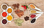 Various spices selection on wooden table