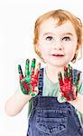 cute little girl with finger paint. vertical image in light grey background