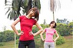 Asian Chinese woman workout outdoor, stretching