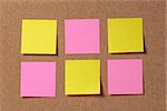 six reminder sticky notes on cork board, empty space for text