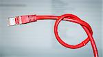 An image of a red networking cable with a knot
