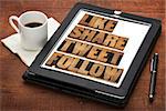 like, share, tweet, follow words - social media concept - isolated text in vintage letterpress wood type on a digital tablet with cup of coffee