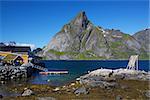 Traditional fishing harbor and dried stockfish on Lofoten islands in Norway