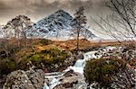 The mountain is Buachaille Etive Mor which rises above Rannoch Moor to a height of 1022m It is located in  Glencoe in the Lochaber region of Scotlands Highlands