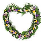 Wild flower heart shaped wreath over white background.
