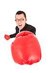 angry businessman attack to enemy with boxing gloves