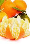 Fresh Ripe Tangerine with Segments and Citrus Peel and Some Full Body with Leafs closeup on white background
