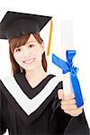 Young graduate girl student holding and showing diploma