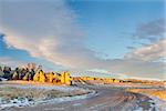 back country road over prairie in northern Colorado with Natural Fort geological landmark