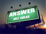 Answer Just Ahead - Green Billboard on the Rising Sun Background.