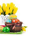 easter eggs with spring flowers isolated on white background
