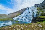 Dynjandi is the most famous and beautiful waterfall of the West Fjords in Iceland.