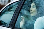 Young Woman in Car on Rainy Day, Mannheim, Baden-Wurttemberg, Germany