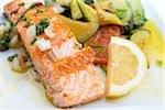 Fresh Salmon with lemon and bread - A seafood salad with smoked salmon