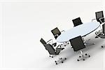 Black chairs around a light office table