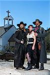Old West Characters Pose Infront of Church