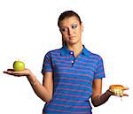 Woman with hamburger and apple isolated on white