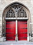 Red church door of the Zuiderkerk in Leiden, the Netherlands