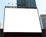 A large blank urban billboard with copy space