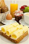 breakfast in morning with fruits  cheese toast coffee on wooden table