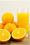 fresh and  healthy tasty orange juice on wooden background