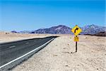 Road prospective in the middle of Death Valley desert, USA