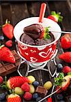 Strawberry dipped in chocolate fondue