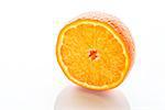 Image of a sliced orange on white background