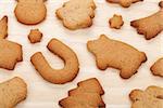 Various gingerbread cookies on wooden table background