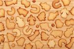 Various gingerbread cookies on wooden table background