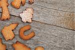 Various gingerbread cookies on wooden table background with copy space