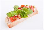 deliscious fresh bruschetta appetizer with tomatoes isolated on white background