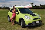 The young beautiful women with car