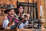 Smiling Sheriff Stands With Woman and a Loaded Gun