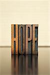 The word HOPE written in vintage letterpress type