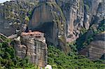 The Holy Monastery of Rousanou or St. Barbara is one of Meteora rock pillars in Greece. This is good combination of ancient architecture and mountain landscape.