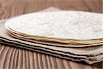 wheat round tortillas, on old wooden table rustic style