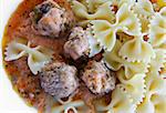 Small meat balls with pasta and red sauce