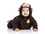 Baby boy dressed in monkey costume over white