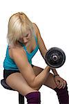 Athletic girl making exercises with dumbbell - isolated photo portrait