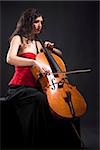 Young Woman in Red Top Playing Violoncello