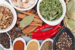 Herbs and spices on wood table background