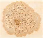 Gingerbread dough for christmas cookies with cutter