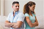 Young couple fighting in living room