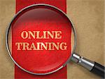 Online Training concept. Magnifying Glass on Old Paper with Red Vertical Line Background.