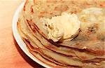 Close up of a pancakes pile with copy-space on the top