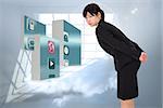 Serious businesswoman bending against room with holographic cloud