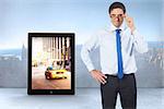 Thinking businessman tilting glasses against city scene in a room